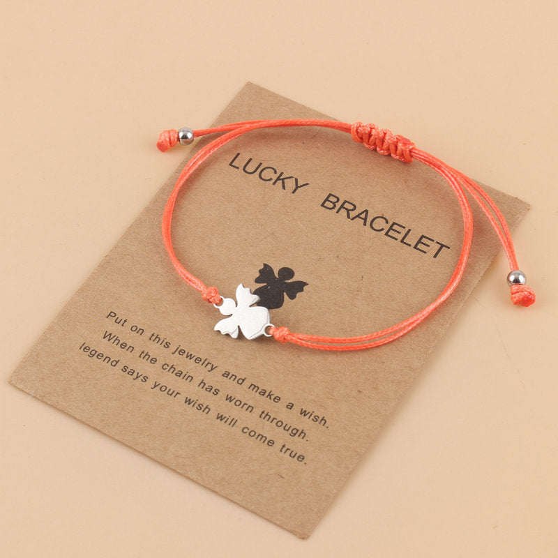 Lyckoängel – betonar både skyddsängeln och den lyckobringande kraften.