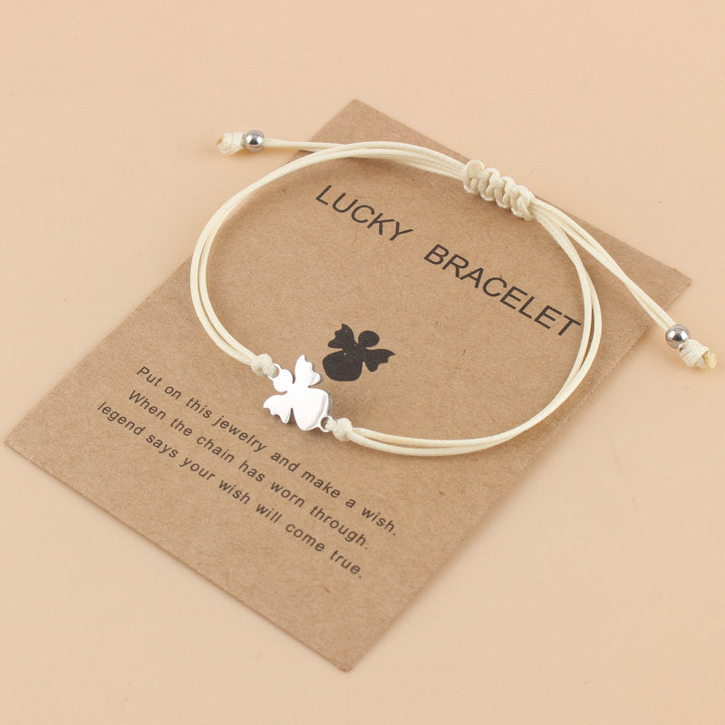 Lyckoängel – betonar både skyddsängeln och den lyckobringande kraften.