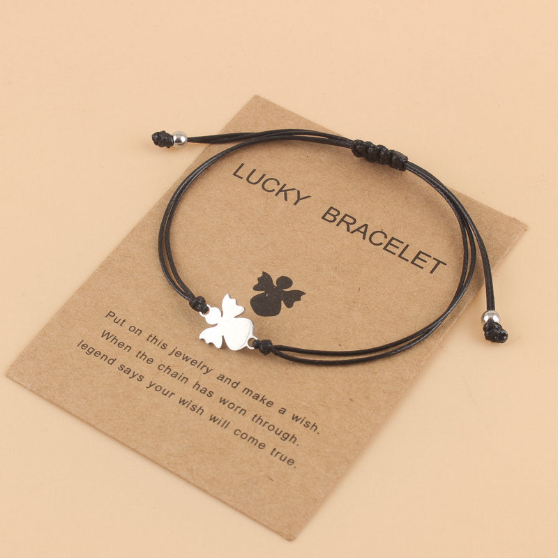 Lyckoängel – betonar både skyddsängeln och den lyckobringande kraften.