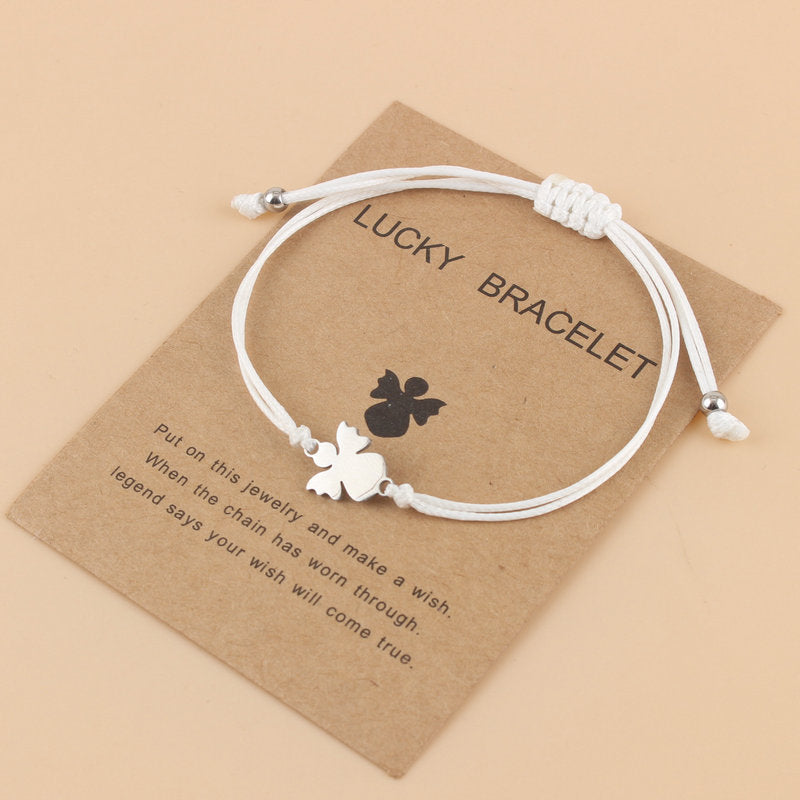 Lyckoängel – betonar både skyddsängeln och den lyckobringande kraften.