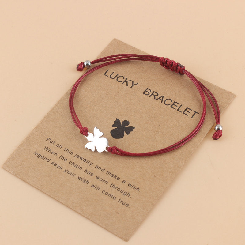 Lyckoängel – betonar både skyddsängeln och den lyckobringande kraften.