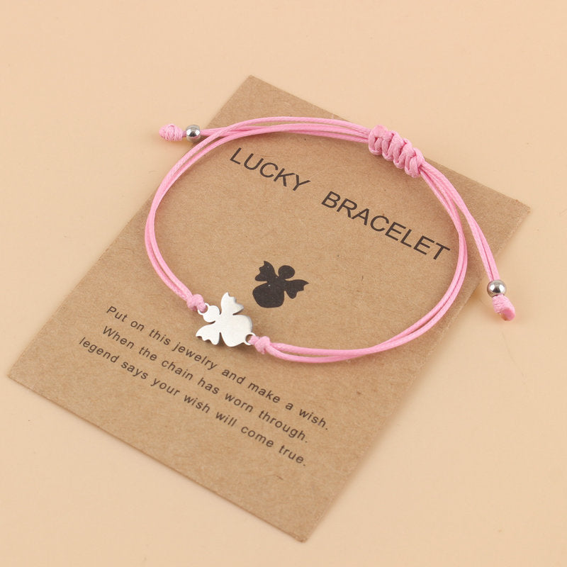 Lyckoängel – betonar både skyddsängeln och den lyckobringande kraften.