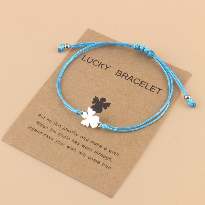 Lyckoängel – betonar både skyddsängeln och den lyckobringande kraften.